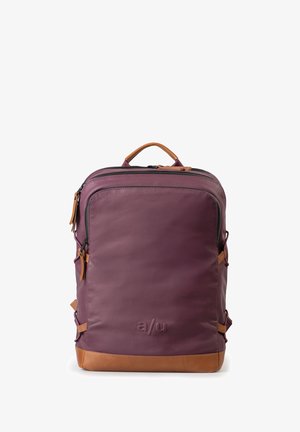 Purple backpack with tan leather accents, featuring adjustable straps, a top handle, and zippered compartments for organized storage.