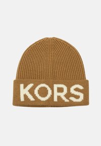 Brown knit beanie with a ribbed texture and a folded cuff. Features white "KORS" lettering on the cuff.