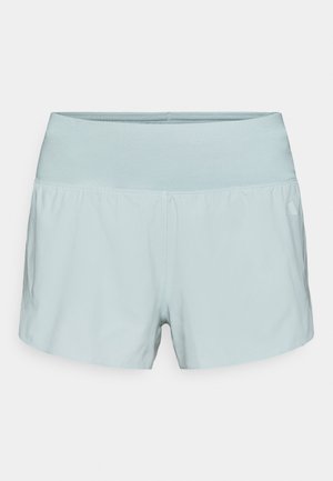 Light blue athletic shorts with a wide elastic waistband, smooth texture, and a slightly loose fit. No visible patterns or hardware details.