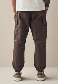 Next STRETCH UTILITY REGULAR TAPERED - Kareiviško stiliaus kelnės - purple