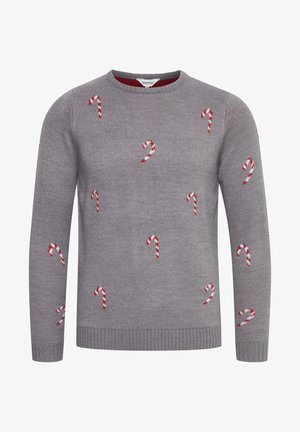 Hallide hallide kudum, millel on punased ja valged piparkoogivitsad, tikitud ees. Ribiga varrukad ja serv, et lisada tekstuuri.