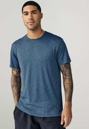 Short-sleeve athletic t-shirt in textured dark blue fabric, featuring a round neckline and subtle horizontal stripes.