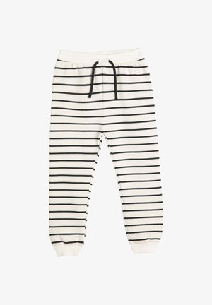 Spodnie dresowe w paski w kolorze kremowym i czarnym, elastyczna talia z sznurkiem, ściągacze na mankietach, materiał bawełniany, z poziomymi paskami.