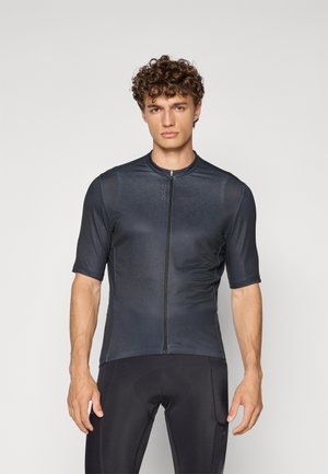 Maillot de cyclisme à manches courtes en bleu foncé, fabriqué en tissu léger et extensible. Il dispose d'une fermeture éclair à l'avant et d'un col montant.