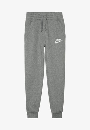 Szare dresowe spodnie Nike z elastycznym pasem, sznurkiem, kieszeniami bocznymi, ściągaczami u dołu nogawek i białym logo Nike na lewym udzie.