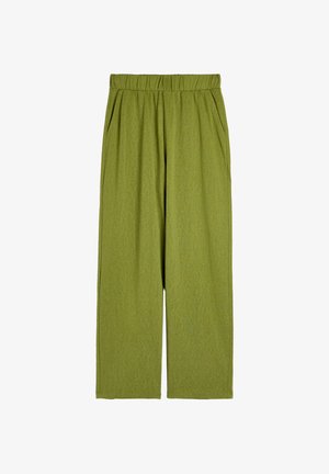 Oliwkowe spodnie o szerokich nogawkach wykonane z teksturowanej tkaniny, z elastycznym paskiem w talii i bocznymi kieszeniami. Prosty, luźny krój.