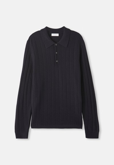 Dark navy long-sleeve knitted polo sweater with three buttons and ribbed cuffs, featuring a textured vertical stripe pattern.