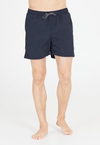 Marina simbyxor i lätt tyg, med ett elastiskt midjeband med snörning och sidofickor för extra bekvämlighet.