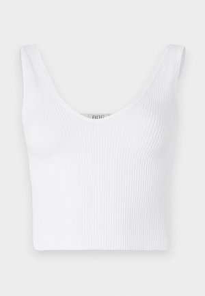 White ribbed crop top with wide straps and a deep V-neckline. Soft texture with a fitted shape and collar-less design.
