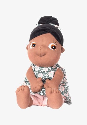 Soft-bodied doll with dark skin, brown eyes, and a black ponytail. Wears a floral-patterned dress in green and pink, with bare feet.