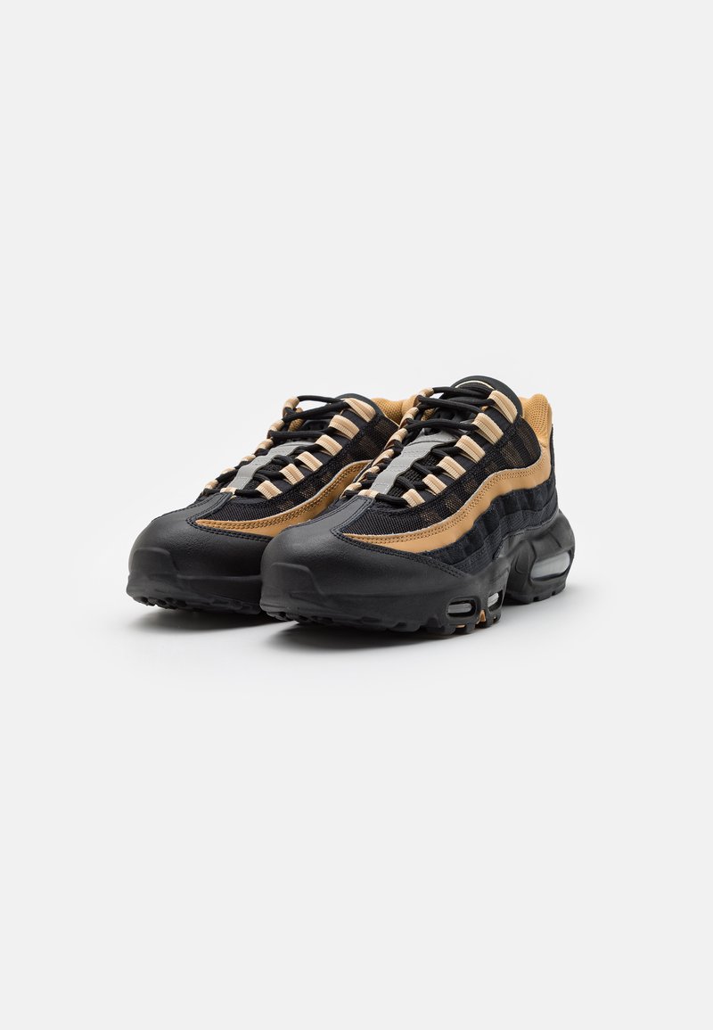 black and gold nike 95