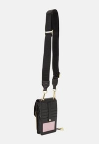 Black leather crossbody bag with croc-embossed texture, gold hardware, and adjustable strap featuring a logo. Includes a pink ID card pocket.