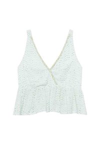 Top peplum sin mangas de color blanco con escote en V, hecho de una tela texturada, con pequeños patrones de puntos verdes y un fino ribete decorativo a lo largo del escote.