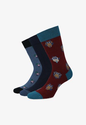 Trzy pary skarpet: bordowe z wzorami sów, granatowe z wzorami napojów i czarne. Wykonane z dzianiny, różne kolory mankietów, długość do połowy łydki.