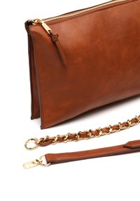 Brown leather clutch with a textured finish, gold zipper, and detachable chain strap. Features a flat, rectangular shape.