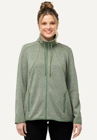 Grön fleecejacka med hög krage, hel dragkedja och dragsnören. Har sidofickor och en strukturerad, melerad finish.