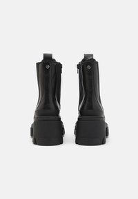 ALDO Wide Fit Kotníkové boty na platformě - black