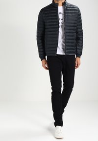 Tommy Hilfiger Dunjakker - black