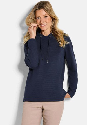 Marineblauwe hoodie van een textuurstof, met een voorzijde kangoeroezak, verstelbare trekkoordcapuchon en lange mouwen.