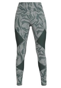 Legginsy w wzorzysty design w odcieniach zieleni i bieli, z teksturowanym pasem i kontrastującymi zielonymi akcentami po bokach.