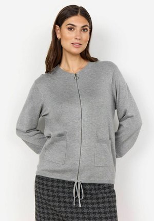Gray zip-up cardigan made of soft fabric, featuring long sleeves, side pockets, and a round neckline. Drawstring detail at the hem.