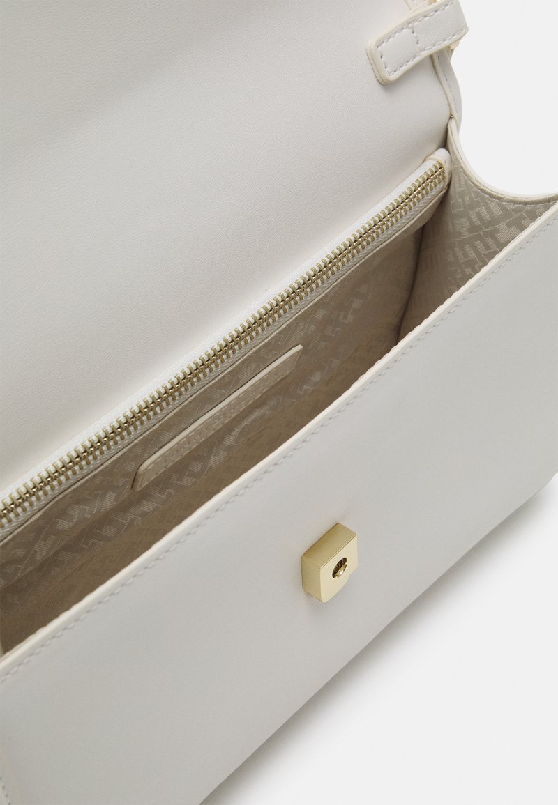 Tommy Hilfiger MONOTYPE SHOULDER BAG - Handtasche - ecru/offwhite  