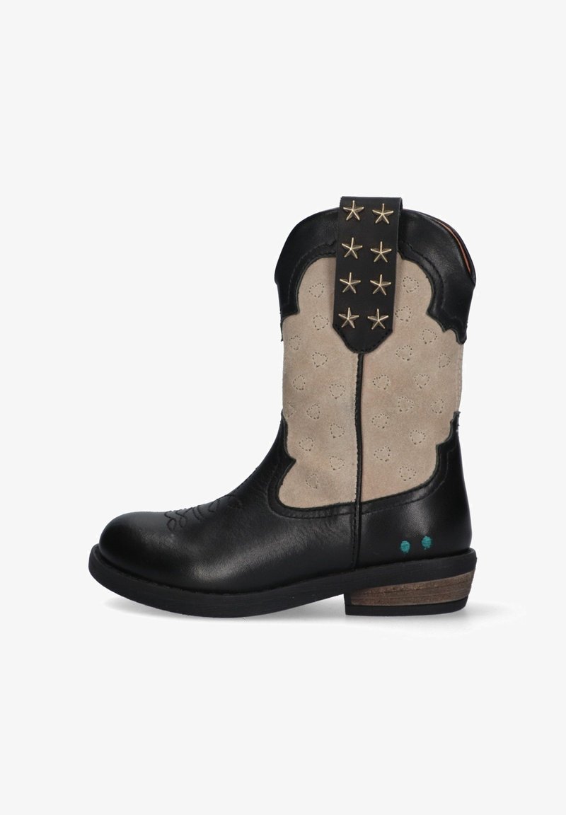 Black leather cowboy boots with beige suede accents, star detailing on the heel tab, and heart-shaped perforations on the sides.