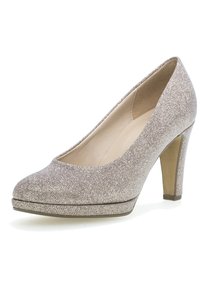 Beige glitter high-heel pump with a rounded toe, textured upper, and 3-inch heel. Smooth inner lining, subtle platform accent at the front.