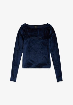 Mørkeblå langermet topp laget av myk, glatt stoff. Har en utskjæring på brystet og en vid halslinning.
