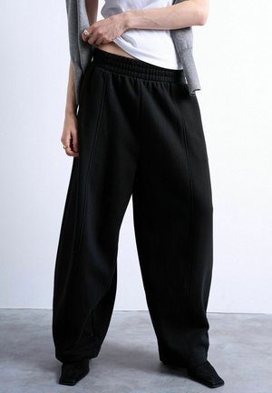 JOGGING TSRIKKE - Bukser - black