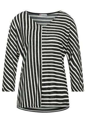 Schwarz-weißes Langarmshirt mit vertikalen Streifen auf der linken Seite und horizontalen Streifen auf der rechten Seite, rundem Ausschnitt.