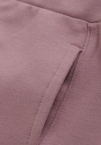 Tight passform hoodie i mjuk, ljus mauve-tyg med en fin textur, med en liten sidoficka och släta sömnadsdetaljer.