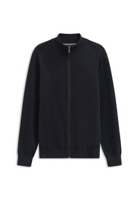 Giacca nera con zip e colletto alto, polsini e orlo a costine. Tessuto morbido e design minimalista. Sottile dettaglio della cerniera marrone.
