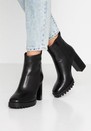 Enkellaarsjes met hoge hak - black