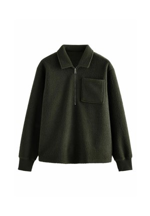 Sudadera de felpa con media cremallera en verde oscuro, con un acabado texturizado, un cuello y un bolsillo en el pecho. Los puños tienen una tela más oscura.