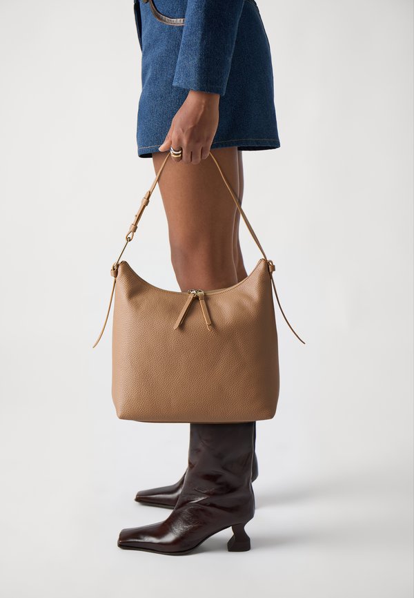 MALORY - Handtasche - skin