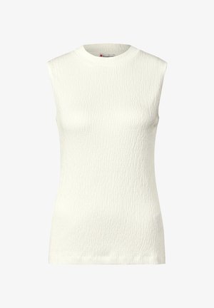 Haut blanc sans manches en tissu texturé avec de subtils motifs linéaires. Encolure arrondie et coupe ajustée ; finition lisse.