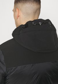 Champion HOODED JACKET - Spordijakk - black