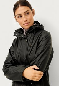 Áhkká Parkaer - schwarz