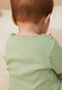 Next FAMILY - REGULAR FIT - Salopetă bebeluși - sage green mummy