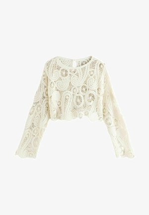 Kreminės nėrinių viršutinės dalies marškiniai su sudėtingais sukiniais, ilgomis rankovėmis, apvaliu iškirpimu ir galiniu rakto skylutės dekoru.