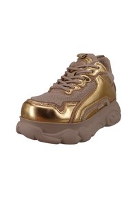 Sneaker with a light beige fabric upper and shiny gold accents. Features chunky sole, round laces, and padded collar for comfort.