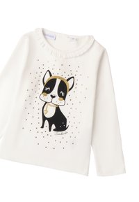 Weißes Baumwollhemd mit langen Ärmeln, das eine Illustration eines schwarzen Hundes mit goldenen Akzenten und Strasssteinen zeigt, rüschigem Rundhalsausschnitt und lässiger Passform.