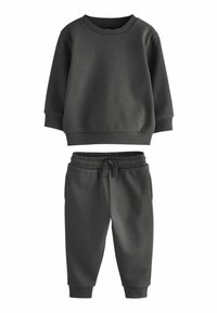 Dunkelgrauer Sweatshirt und passende Jogginghose, aus weichem Stoff gefertigt. Das Sweatshirt hat einen Rundhalsausschnitt und gerippte Bündchen; die Jogginghose hat einen elastischen Bund.