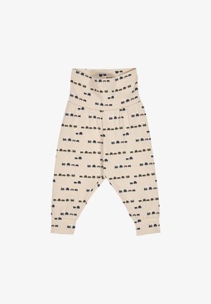 Béžové dětské harémové kalhoty z měkké látky, zdobené opakujícím se vzorem barevných nákladních aut a širokým, pružným pasem.