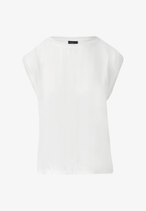 Balta blūze, kas izgatavota no gludas auduma, ar vienkāršu apaļu dekoltē un īsām, brīvām piedurknēm. Apakšmala ir nedaudz noapaļota sānos.