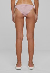 Karl Kani SMALL SIGNATURE CRINKLE LEG  - Spodnji deli kopalk - rose