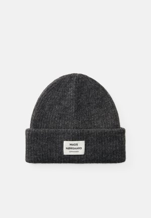 Dark gray knitted beanie with a folded cuff. Features a rectangular tag with "MADS NØRGAARD COPENHAGEN" in black letters.
