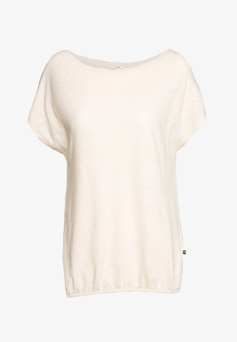 T-shirt blanc, ample, avec un col large, des manches courtes et un ourlet froncé. Texture douce avec une légère variation de surface.