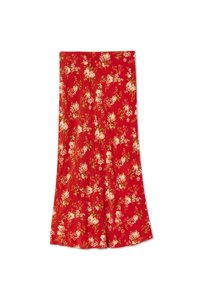 Red floral skirt with a flowing design. Features white and pink flower patterns with green accents on lightweight fabric.
